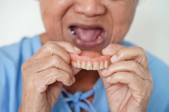 Removable denture illustration, illustrative dental-care visual